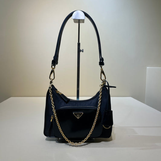 PRADA/ Recycled nylon and leather / Handbag/ Mini / Women's/ Black