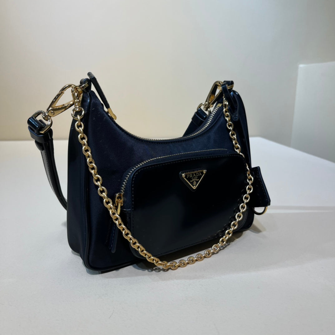 PRADA/ Recycled nylon and leather / Handbag/ Mini / Women's/ Black