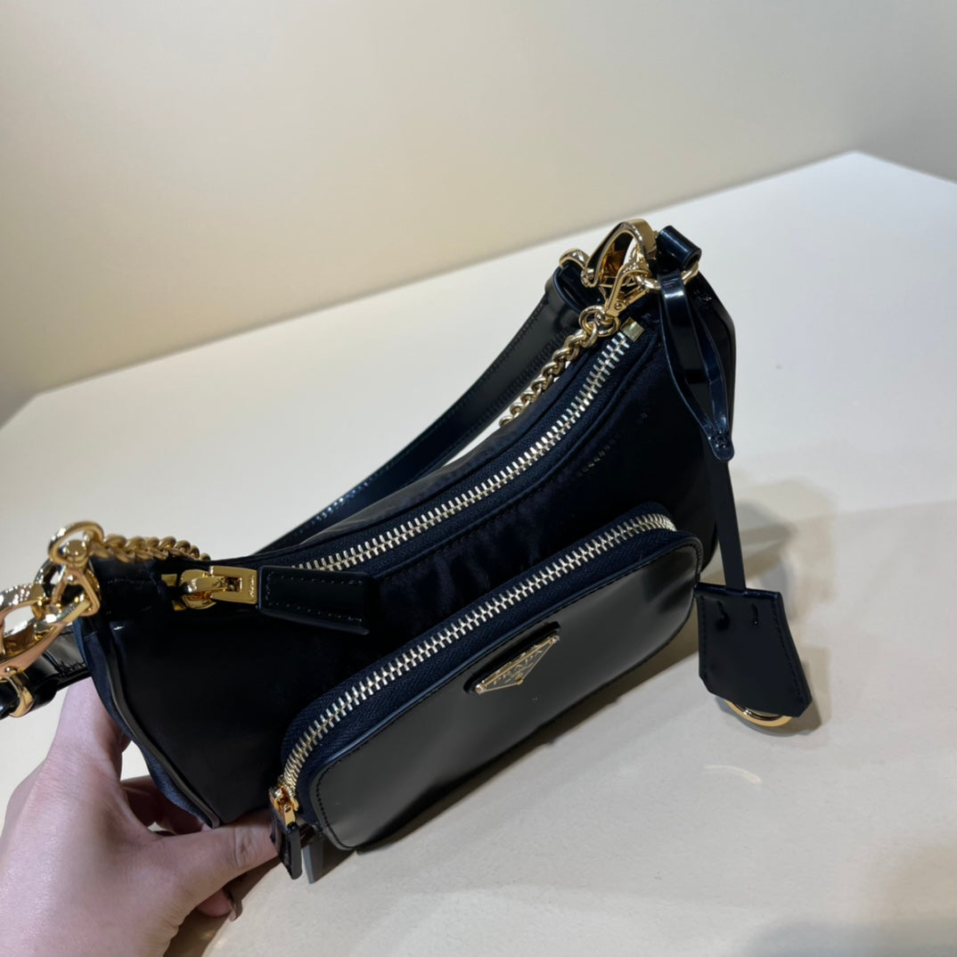 PRADA/ Recycled nylon and leather / Handbag/ Mini / Women's/ Black