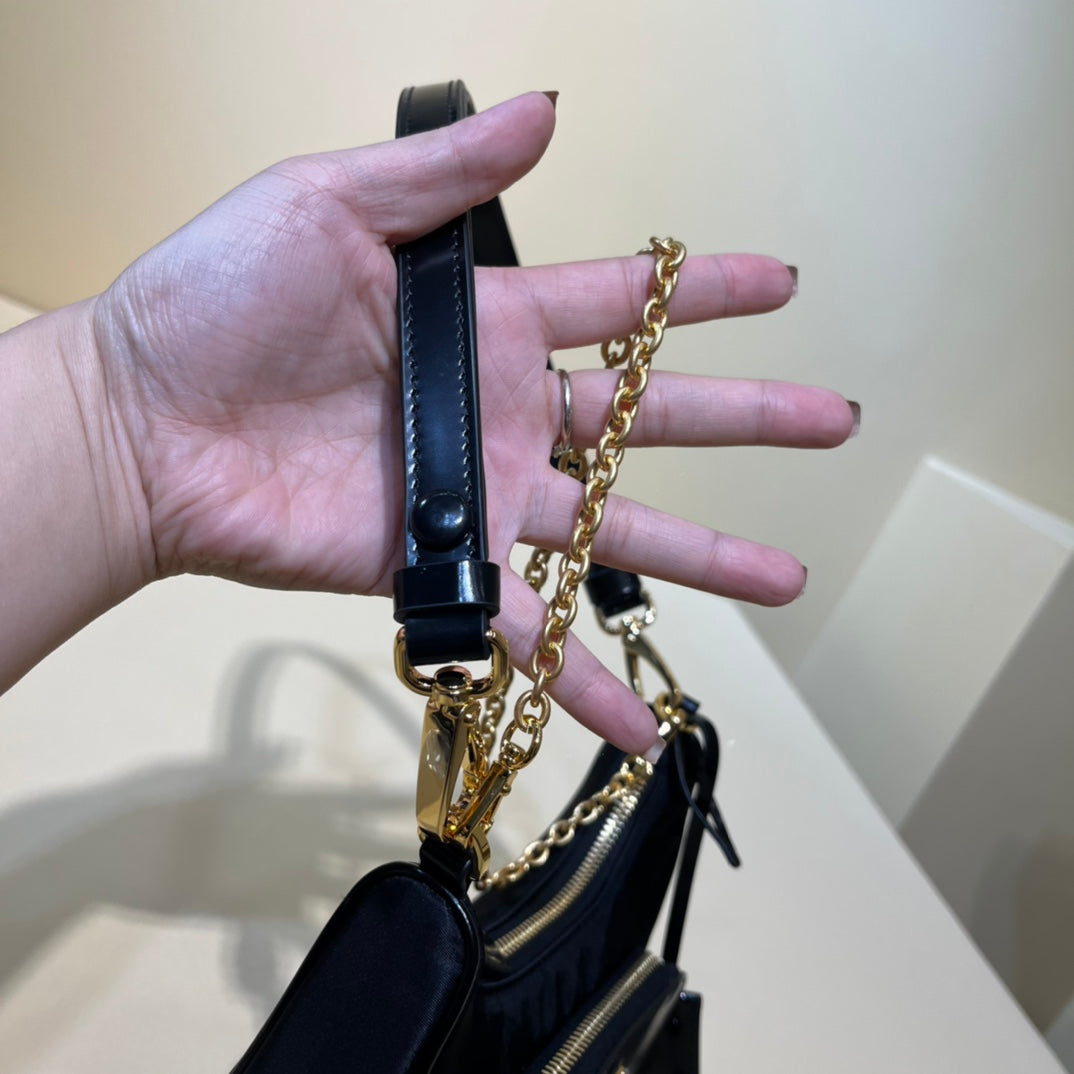 PRADA/ Recycled nylon and leather / Handbag/ Mini / Women's/ Black