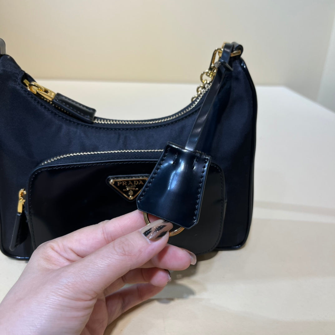 PRADA/ Recycled nylon and leather / Handbag/ Mini / Women's/ Black