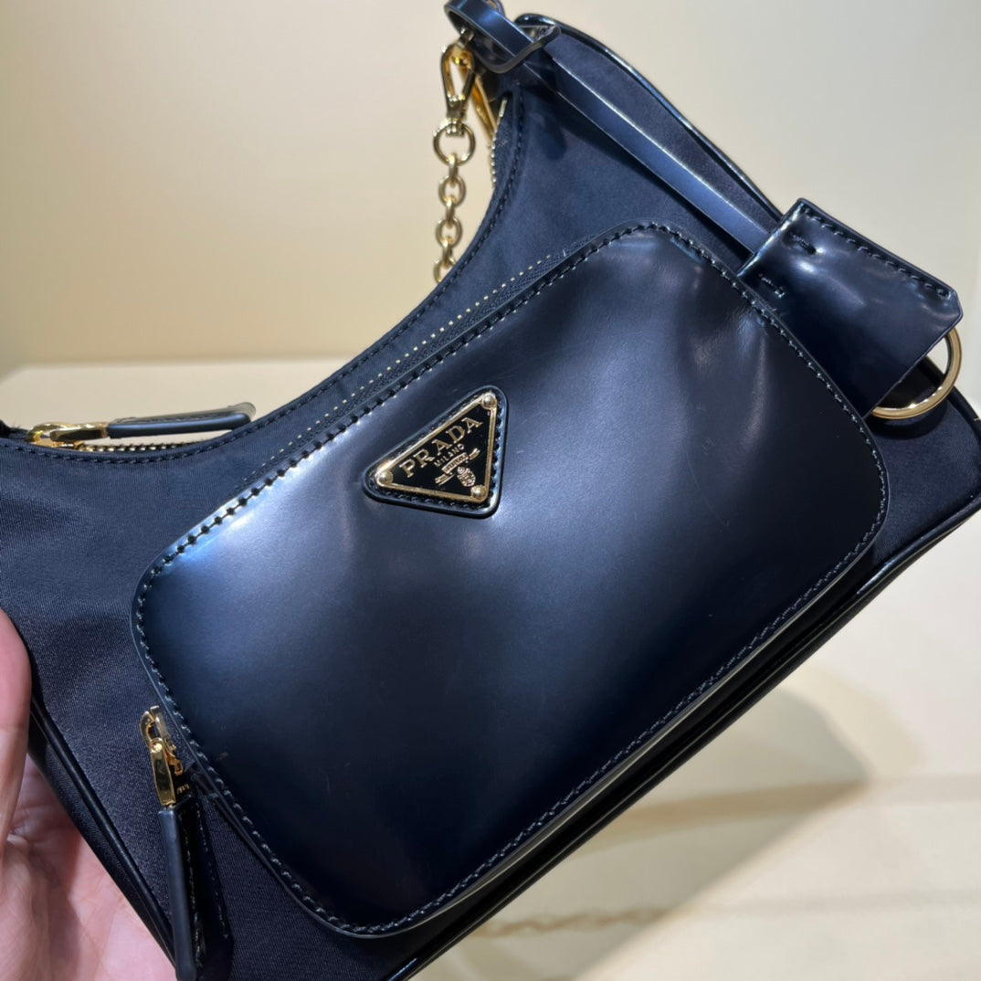 PRADA/ Recycled nylon and leather / Handbag/ Mini / Women's/ Black